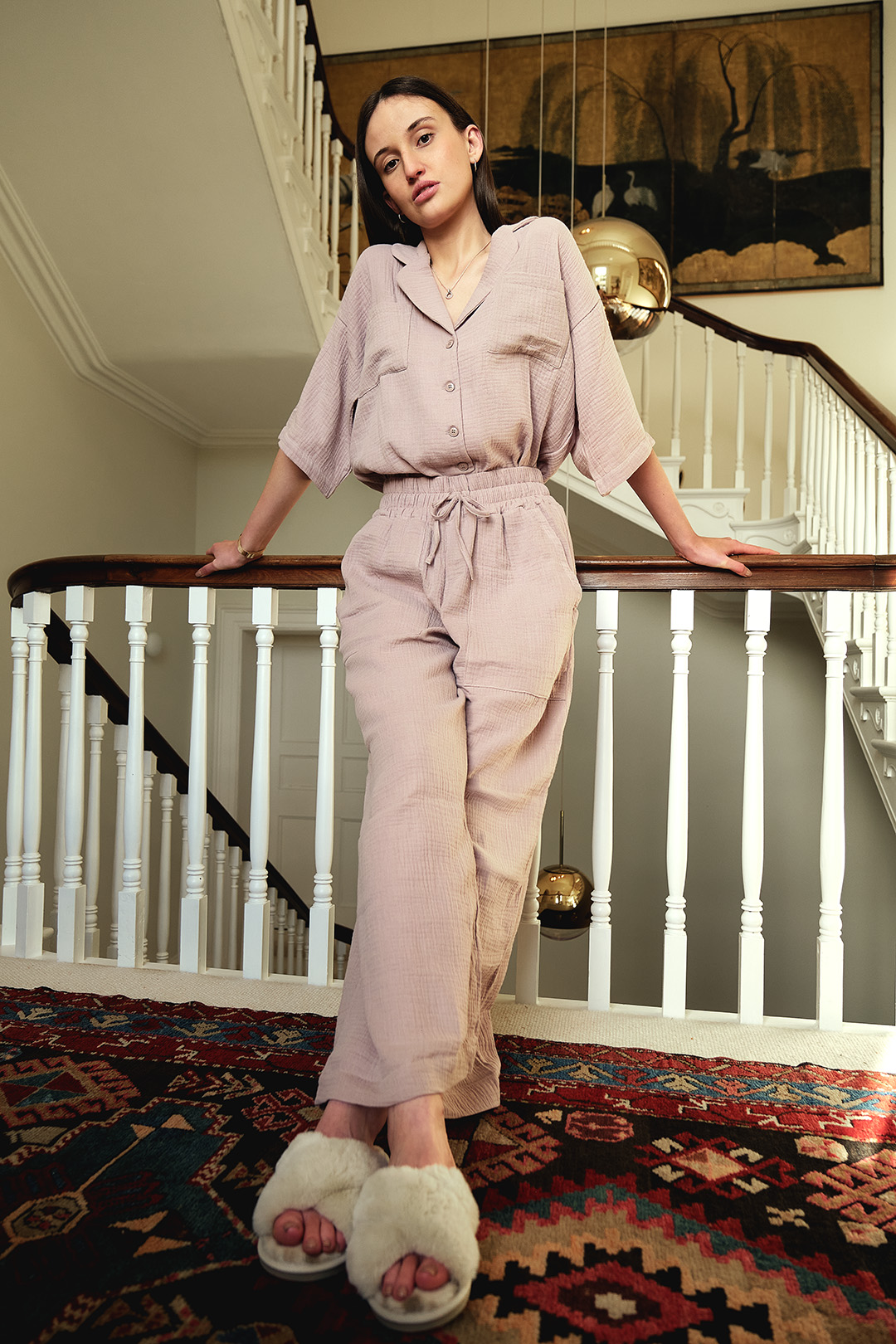 Woman on stairs in Cotone Collection Taupe long pyjamas - Beautiful Quality Sleepwear